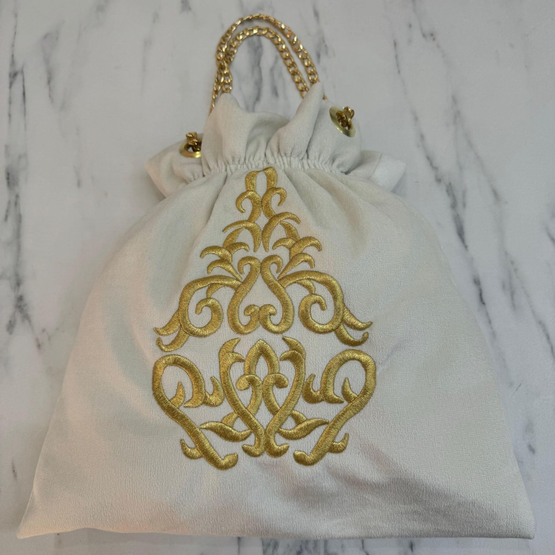 Lastikli Sim Sırma Kadife Çanta Krem